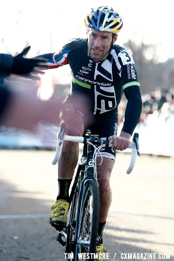 Tim Johnson is congratulated by fans along the finish line. ©Tim Westmore